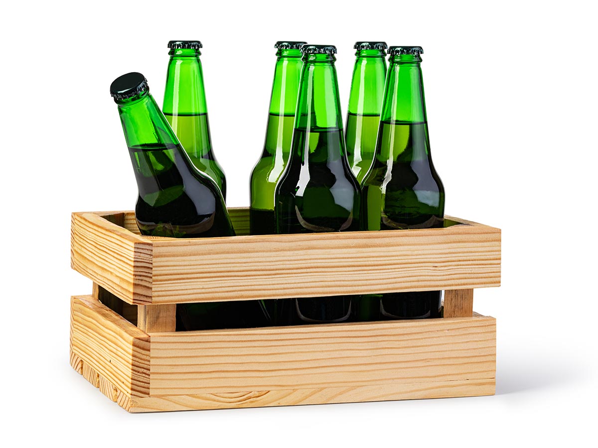 Beer bottles in wooden crate.